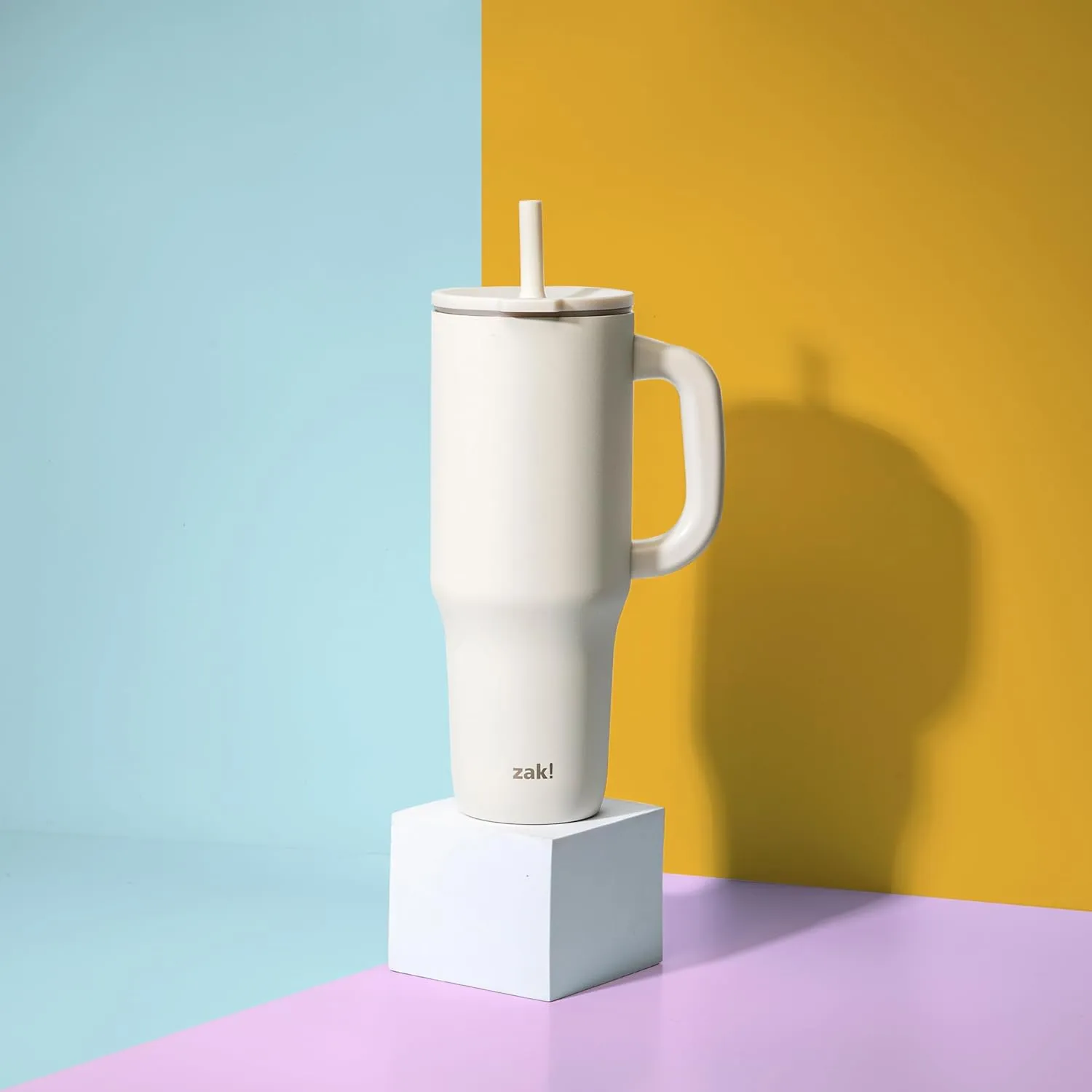 Zak Designs Sutton Travel Tumbler for On the Go, 40oz Stainless Steel with Vacuum Insulation, Silicone Straw, and Carry Handle for Cold Drinks (Cream White)